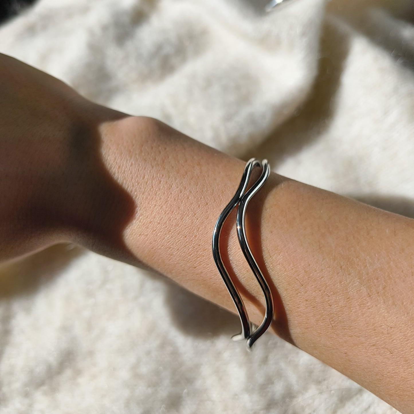Elegant Silver-Plated Wave Bangle