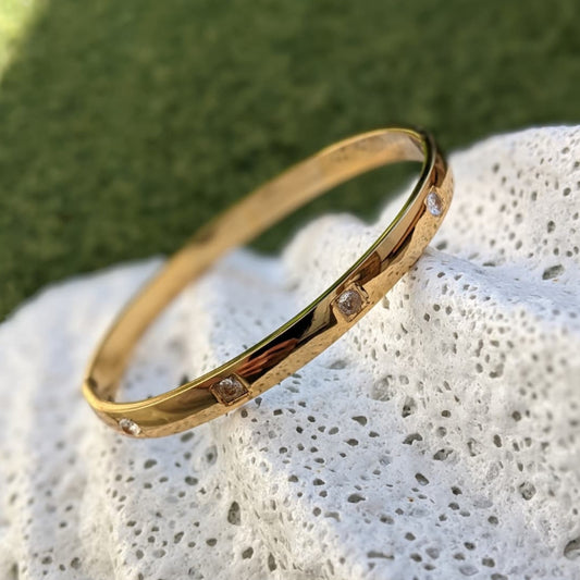 Gold Plated Titanium Steel Bangle with Subtle Crystal Accents