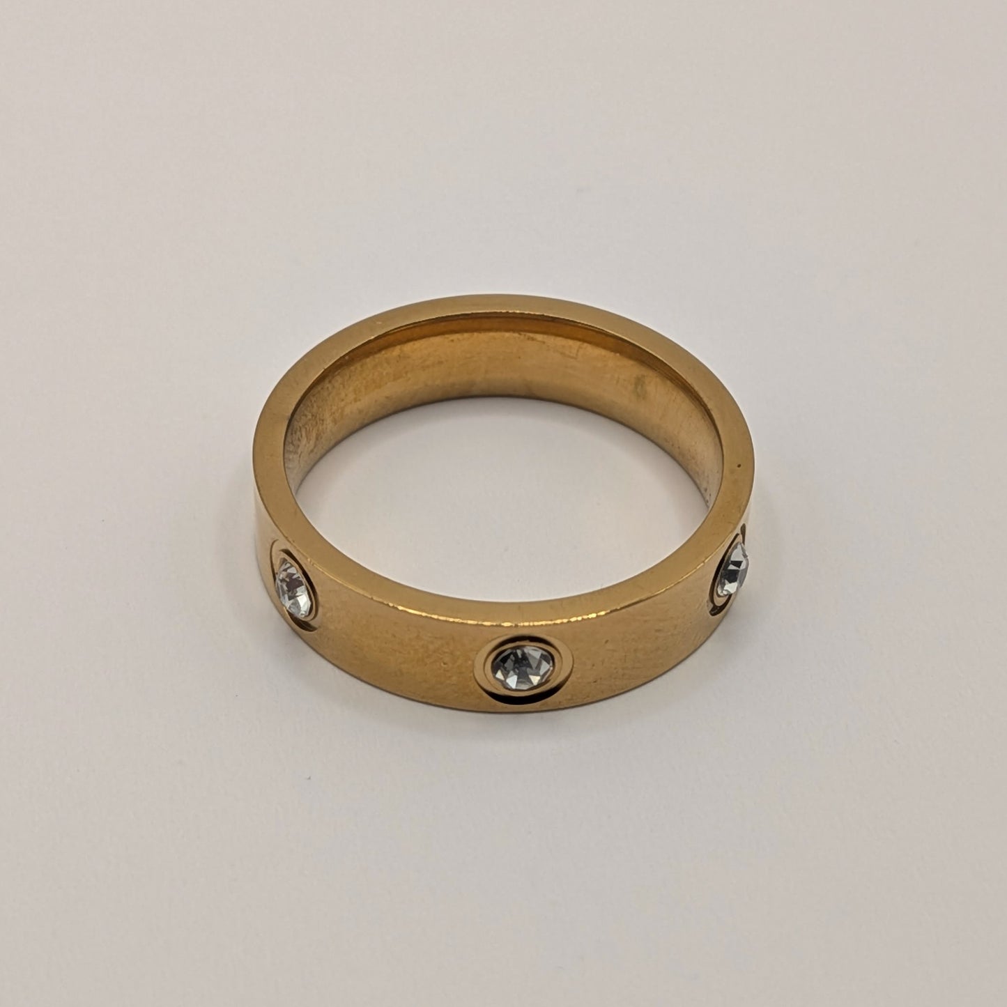 Classic Diamond-Studded Gold Band Ring