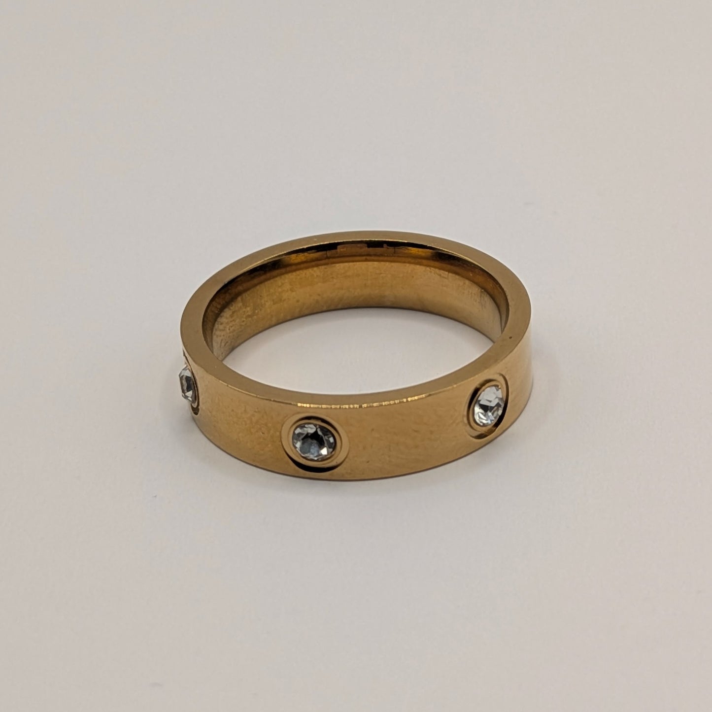 Classic Diamond-Studded Gold Band Ring